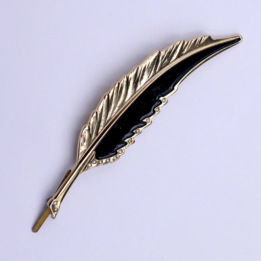 pluma dorada